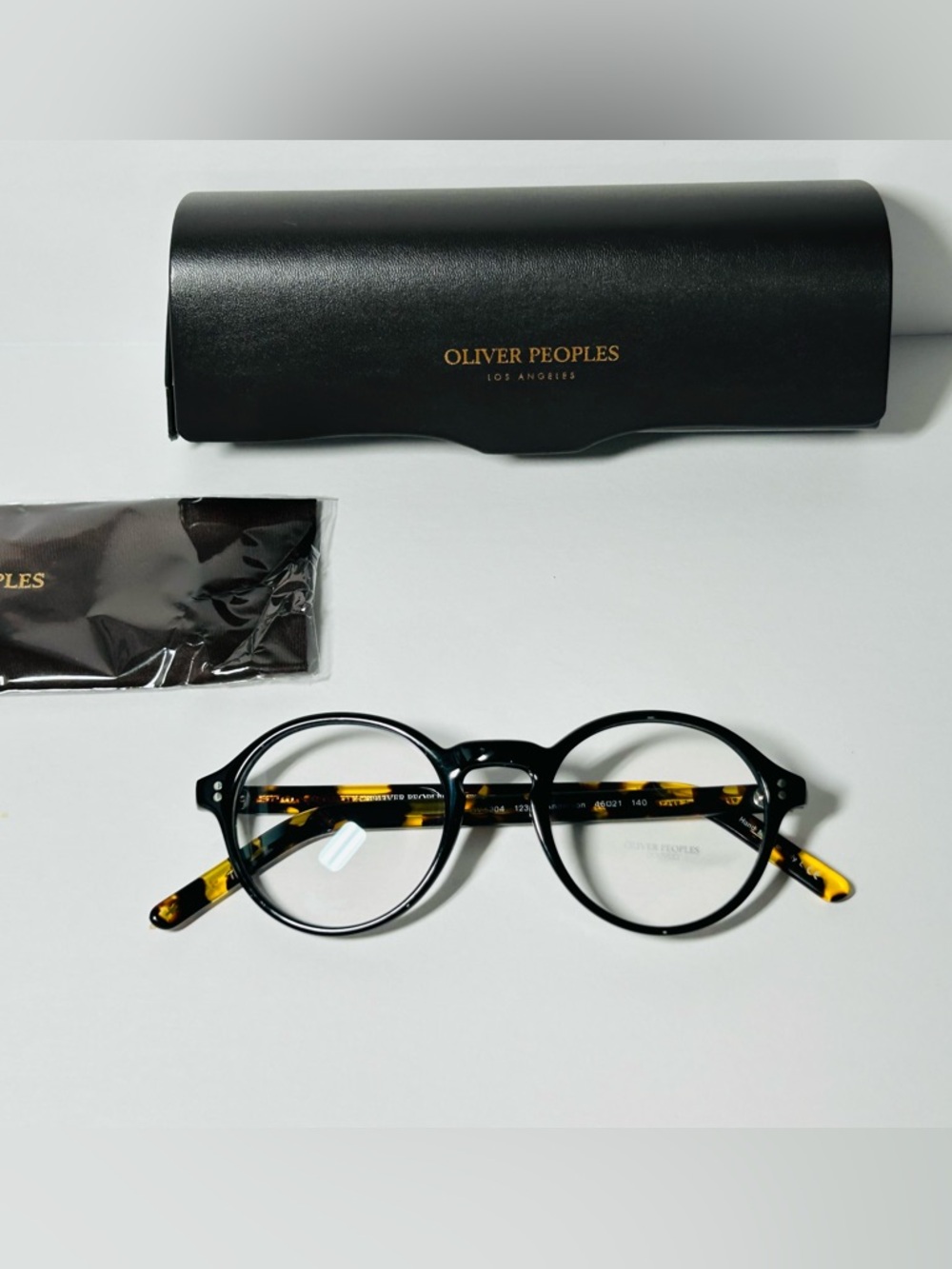 Oliver Peoples Black Fronts with Tortoise Temples Round Glasses